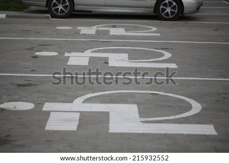 markings on the asphalt parking for disabled