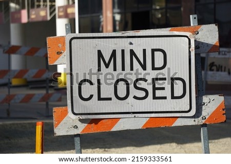 Mind closed road sign barricade                                Royalty-Free Stock Photo #2159333561