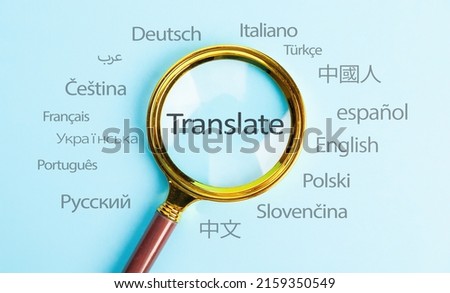 Translate text, International language translation search concept with magnifying glass. Concept of online translation from foreign language Royalty-Free Stock Photo #2159350549