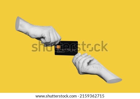 The black plastic credit card is in the hands of two women holding it from different sides isolated on a yellow background. Trendy 3d 
collage in magazine style. Contemporary art. Modern design