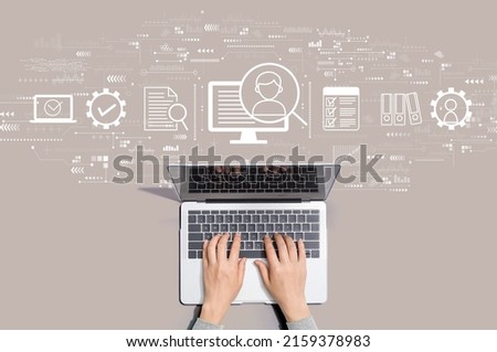 Document management system concept with person using a laptop computer