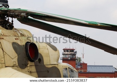 Air Traffic Control Tower With Russian Attack Helicopter