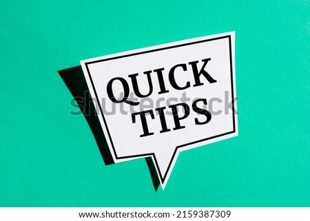 Quick Tips Concept speech bubble isolated on green background.