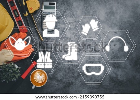 Work safety concept, Top view engineer office with VR screen work safety icon, First secure rules. Health protection, personal security people on job.	
