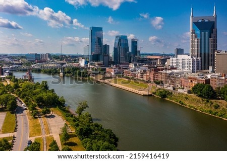Downtown Nashville Riverfront Tennessee. Nashville is the capital of the U.S. state of Tennessee and home to Vanderbilt University. Legendary country music venues include the Grand Ole Opry House Royalty-Free Stock Photo #2159416419