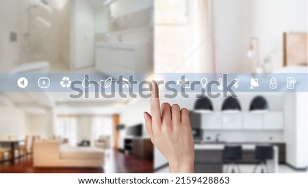 Women hand point smarth home GUI control every room in house. Hand use smart screen smart home automation assistant on a virtual screen and a user touching a button Royalty-Free Stock Photo #2159428863
