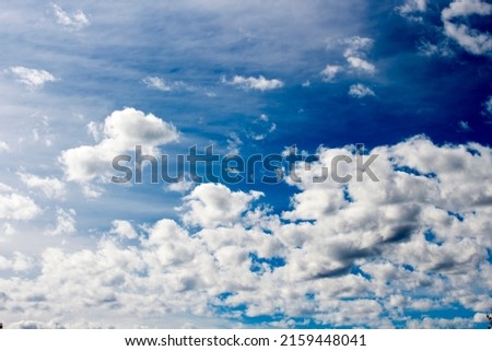 One of the most spectacular cloud types, altocumulus lenticularis (also known as lenticular clouds) are lens-shaped clouds that form over hilly areas, sometimes referred to as spaceship clouds . Royalty-Free Stock Photo #2159448041