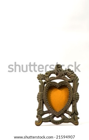 The antique photo frame isolated over white