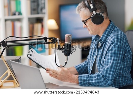 Professional speaker checking the podcast schedule during the live stream