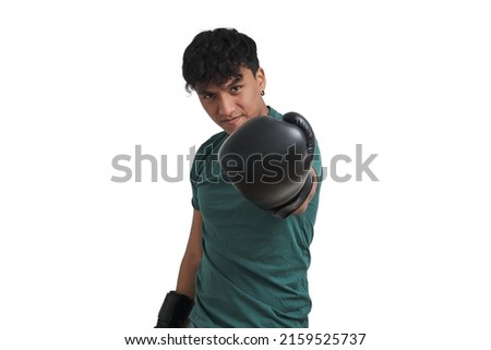 Young peruvian boxer with defiant look. Isolated over white background. Royalty-Free Stock Photo #2159525737