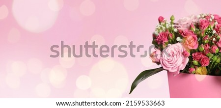 Bouquet of beautiful flowers on pink background, space for text. Banner design