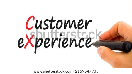 CX customer experience symbol. Concept words CX customer experience on white paper. Businessman hand with marker. Beautiful white background. Copy space. Business and CX customer experience concept.
