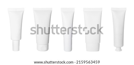 Set with blank tubes of cosmetic products on white background. Mockup for design Royalty-Free Stock Photo #2159563459