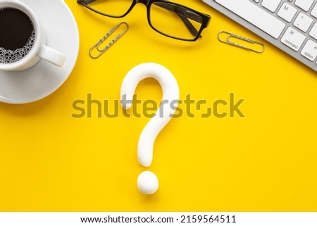 Question mark icon on office or students desk. Solving problem concept