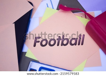 Football. Text on adhesive note paper. Event, celebration reminder message.