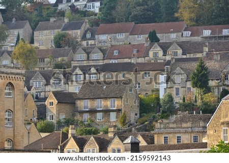 Scenic view of houses and buildings on a hill in a beautiful old town - namely the historic town of Bradford on Avon in Wiltshire England
