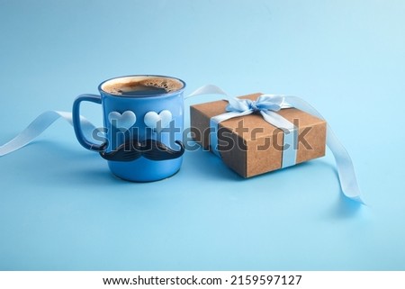 Happy Father's Day inscription with a cup of coffee Royalty-Free Stock Photo #2159597127
