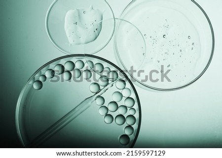 Abstract cosmetic laboratory. Chemical laboratory research. Cosmetic Essence Royalty-Free Stock Photo #2159597129