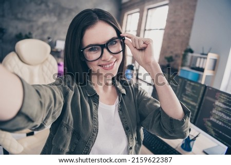 Photo of young cheerful confident girl expert boss make take selfie date server service designer indoors