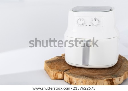 Air Fryers - Hot Air Circulation To Cook Food; Photo On Neutral Background