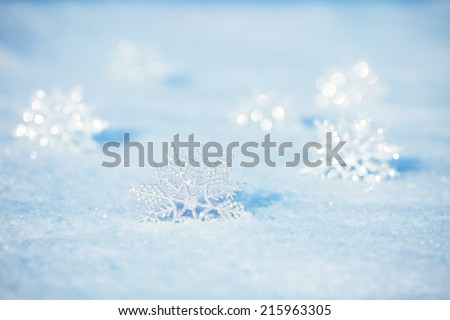 Winter background. Snowflakes on snow