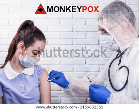 MONKEYPOX. A doctor in a coronavirus suit vaccinates a girl against smallpox. Sign with danger sign and monkey. Virus, epidemic, disease.