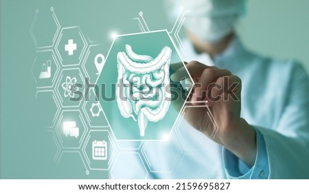 Telemedicine and human Intestine recovery concept. Neutral color palette, copy space for text. Royalty-Free Stock Photo #2159695827