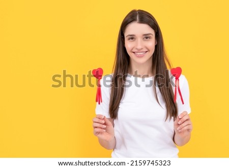 happy valentines day. be my valentine. girl with love symbol on yellow background.