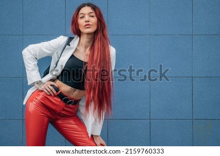 girl posing in the street with funky urban style