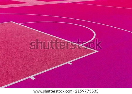 Pink basketball court background. Top view pink field rubber ground with white line outdoors