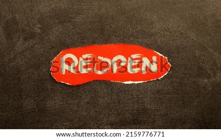 torn paper revealing the word REOPENING on white background.