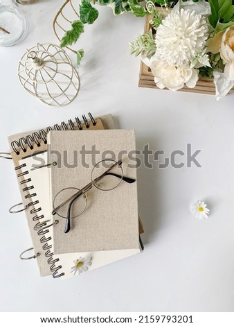 A stack of books on white background