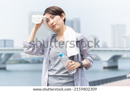Japanese who complain of heat stroke due to heat Royalty-Free Stock Photo #2159802309