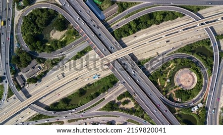 Aerial top view road traffic interchange in city, Aerial view of highway and overpass in city, Expressway top view, Road traffic an important infrastructure, Ecology. Royalty-Free Stock Photo #2159820041