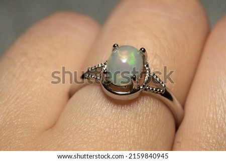 Fashion silver ring with natural white ethiopian opal stone.