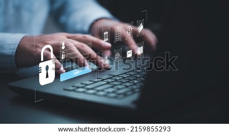 Businessman typing on keyboard laptop computer to input username and password for technology security system and prevent hacker concept. Royalty-Free Stock Photo #2159855293