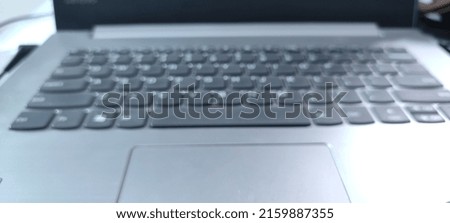 defocus abstract background of laptop keyboard