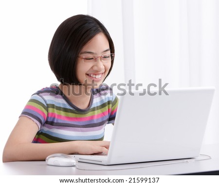 teenage girl with a computer, white background