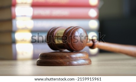 Judicial gavel and books in courtroom closeup. Appeal and court decision concept Royalty-Free Stock Photo #2159915961