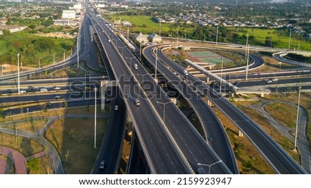Aerial top view road traffic interchange in city, Aerial view of highway and overpass in city, Expressway top view, Road traffic an important infrastructure, Ecology. Royalty-Free Stock Photo #2159923947