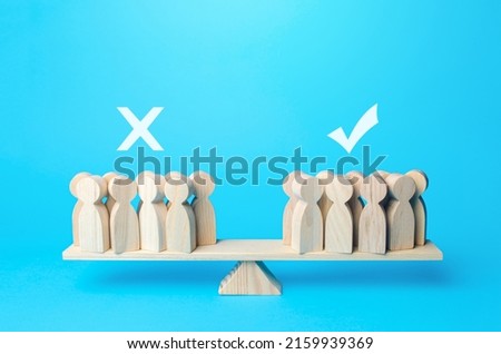 Approval and disapproval. Voting yes or no. People are divided in opinion on the scales. Advantages and disadvantages. Political democratic elections. Divide into opposing factions. Referendum. Royalty-Free Stock Photo #2159939369