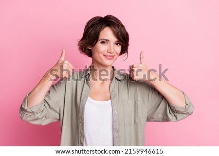 Photo of cool millennial bob hairdo lady thumb up wear outfit isolated on pink color background