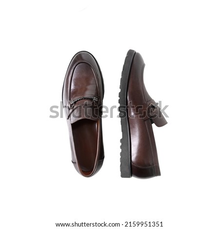 Mans brown leather loafers shoes isolated on white background. Top view. Royalty-Free Stock Photo #2159951351