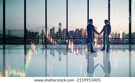 Business investing and brokerage concept with businessmen handshaking in spacious office hall with night city view and virtual glowing raising forex market candlestick Royalty-Free Stock Photo #2159953405