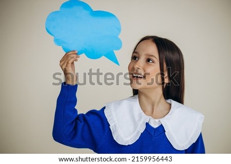 School girl holding speech bubble