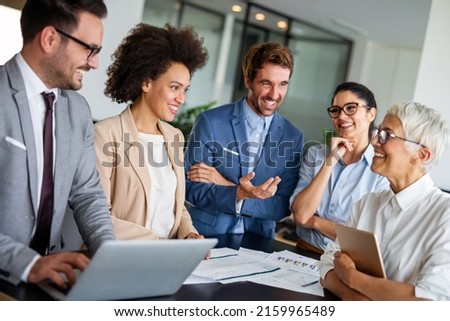 Group of multiethnic business people working at busy modern office