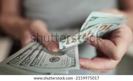 dollar money. bankrupt man counting money cash. business crisis finance lifestyle dollar concept. close-up of a hand counting paper dollars. exchange finance economy dollar usd Royalty-Free Stock Photo #2159975017