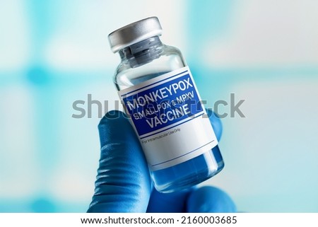 Vaccination for booster shot for Smallpox and Monkeypox (MPXV). Doctor with vial of the doses vaccine for Monkeypox (MPXV) disease Royalty-Free Stock Photo #2160003685