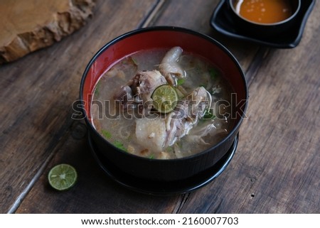 Chicken Soup or Sop Ayam Kampung.  Dishes made from processed native chicken with thick and savory broth