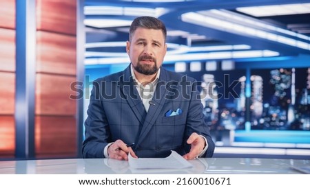 Daily News TV Program: Anchor Presenter Reporting on Business, Economy, Science, Politics. Television Cable Channel Anchorman Talks. Broadcast Network Newsroom Studio Concept. Royalty-Free Stock Photo #2160010671